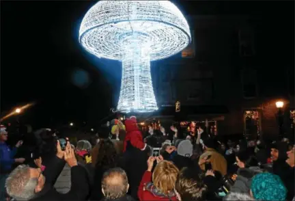  ?? FRAN MAYE — DIGITAL FIRST MEDIA ?? Thousands of people are expected for the fifth annual Mushroom Drop in Kennett Square on New Year’s Eve.