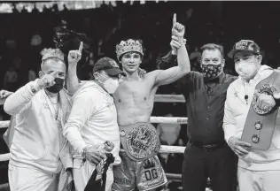  ?? Tim Warner / Getty Images ?? Los Angeles boxer Ryan Garcia, third from left and the main event fighter on Saturday’s Alamodome card, recently announced his mental health struggles on social media.