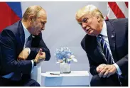  ?? EVAN VUCCI / ASSOCIATED PRESS ?? U.S. President Donald Trump meets with Russian President Vladimir Putin in Hamburg, Germany, on Friday. Trump said, in a tweet, “Now it is time to move forward in working ... with Russia!”