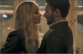  ?? MURRAY CLOSE/TWENTIETH CENTURY FOX VIA AP ?? In this image released by Twentieth Century Fox, Jennifer Lawrence, left, and Joel Edgerton appear in a scene from “Red Sparrow.”