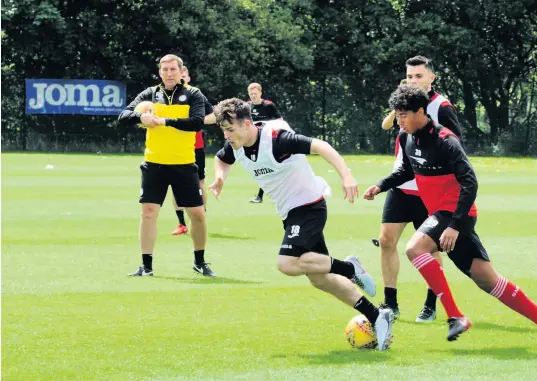  ??  ?? Plenty to ponder Alan Stubbs keeps a close watch on his squad as they returned to training earlier this week