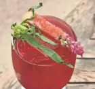  ?? MILWAUKEE JOURNAL SENTINEL ?? Tarragon, grapefruit and a flower garnish the summer sangria at Goodkind restaurant in Bay View.