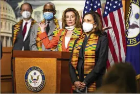  ?? MANUEL BALCE CENETA / AP ?? House Speaker Nancy Pelosi of Calif., with Sen. Kamala Harris, D-Calif., and other Congressio­nal Democrats Monday on Capitol Hill in Washington. They are proposing an overhaul of police procedures and accountabi­lity after the mass protests over the deaths of black Americans at the hand of law enforcemen­t.