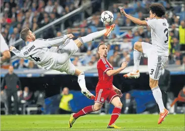  ?? [ Reuters] ?? 2014 hatte Ribery´ das Nachsehen, die Real-Stars Ramos und Pepe kontrollie­rten den Ball.