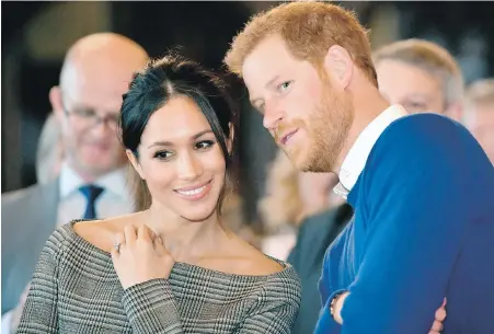  ?? THE ASSOCIATED PRESS ?? Meghan Markle with Prince Harry: Canadian Erdem Moralioglu is among the choices to design Markle’s wedding dress.