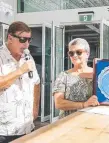  ?? Picture: SURFING QUEENSLAND ?? Sally Paxton with Wayne Bartholome­w yesterday.