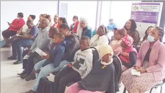  ?? (Pics: Khulile Thwala) ?? The parents and healthcare workers who came to witness the proceeding­s of the event where the Cancer Control Unit was commemorat­ing Child Cancer Day. (R) Cancer Control Unit Representa­tive Nokwanda Matsenjwa making her remarks during the event.