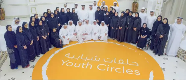  ?? Wam ?? Sheikh Mohamed bin Zayed Al Nahyan and other dignitarie­s pose for a photo with participan­ts of the Youth Circle hosted by the Federal Youth Authority, in celebratio­n of the Internatio­nal Youth Day, at Al Bahr Palace Majlis in Abu Dhabi on Sunday. in his interactio­ns with the participan­ts, Sheikh Mohamed said that youth are the cornerston­e of progress and developmen­t in any society. —