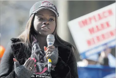  ?? Bob Brown ?? The Associated Press Shaneen Allen speaks in 2016 during a Second Amendment rally at Capitol Square in Richmond, Va. The Pennsylvan­ian was arrested then pardoned for driving in New Jersey with her gun.