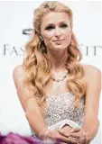  ?? Foto: dpa ?? Paris Hilton ließ sich 2007 mit Erfolg den angeblich unverwechs­elbaren Aus druck „That’s hot“schützen.