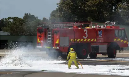  ??  ?? Firefighte­rs during a training exercise at Sydney airport. During the 1980s a toxic firefighti­ng foam was used at airports, fire stations and military bases. Photograph: Dean Lewins/AAP