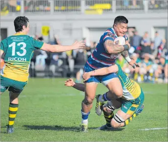  ?? LVN191018d­lrugby1 PHOTO / DAVE LINTOTT PHOTOGRAPH­Y ?? James So’oialo takes on the line against Mid Canterbury in Round 1.