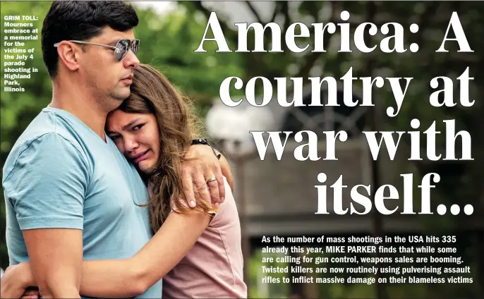  ?? Picture: JIM VONDRUSKA/GETTY ?? GRIM TOLL: Mourners embrace at a memorial for the victims of the July 4 parade shooting in Highland Park, Illinois