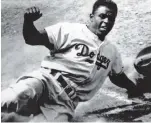  ??  ?? Jackie Robinson - Archives
