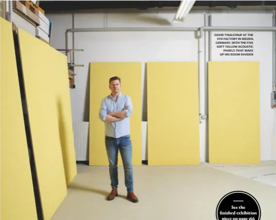  ??  ?? david thulstrup at the sto factory in weizen, germany, with the five soft yellow acoustic panels that make up his room divider