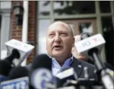  ?? MATT ROURKE — THE ASSOCIATED PRESS ?? Allentown Mayor Edwin Pawlowski speaks with members of the media outside of his home in Allentown, Pa., Wednesday. Pawlowski and the former mayor of Reading have been indicted on federal corruption charges for engaging in a series of pay-to-play...