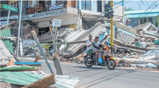  ?? Photo / AP ?? Three earthquake­s in a matter of days have devastated the Indonesian island of Lombok.