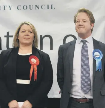  ??  ?? Labour candidate Lisa Forbes and Conservati­ve Paul Bristow as the Peterborou­gh result is announced