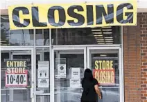  ?? JEFF ROBERSON/AP ?? Economic activity is returning gradually, but some businesses will not survive. Above, a store in St. Charles, Mo.