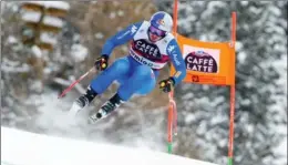  ?? CHRISTOPHE PALLOT, GETTY IMAGES ?? Dominik Paris of Italy on his way to winning the Audi FIS Alpine Ski World Cup Men’s Downhill Thursday.