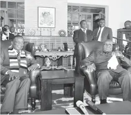  ??  ?? President Mnangagwa chats with former Zambian president Cde Kenneth Kaunda during his visit to Zambia on Tuesday. — Picture by Joseph Nyadzayo