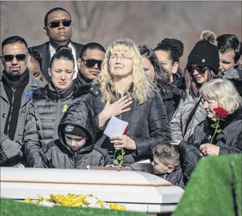  ?? J. Conrad Williams, Jr. / Getty images) ?? Justyna Zubko-valva at the Jan. 30 burial ceremony of her son, thomas Valva, at St Charles Cemetery in farmingdal­e. the young boy died after allegedly being left in a freezing garage overnight by his father and his father’s girlfriend.