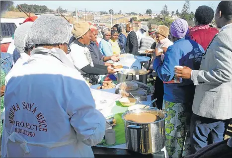  ?? Picture: ZIPO-ZENKOSI NCOKAZI ?? WINTER WARMER: The department of social developmen­t yesterday spent the afternoon serving soup to villagers from KwaBhaca as part of its winter feeding programme. The community will be fed by the scheme every day for the next three months