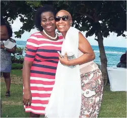  ??  ?? President of the Montego Bay Chamber of Commerce and Industry Gloria Henry (left) is all smiles with Dr Sandra Wright.