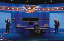  ?? PATRICK SEMANSKY/ASSOCIATED PRESS ?? Democratic vice presidenti­al candidates Sen. Kamala Harris, D-Calif., and Vice President Mike Pence wave before the vice presidenti­al debate Wednesday in Salt Lake City.