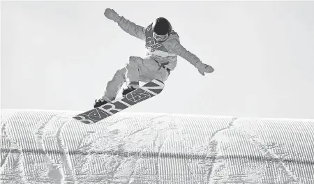  ??  ?? The United States’ Redmond Gerard scored an 87.16 to win the slopestyle gold at Phoenix Snow Park. “Just having fun snowboardi­ng,” said the 17-year-old. KYLE TERADA/USA TODAY SPORTS