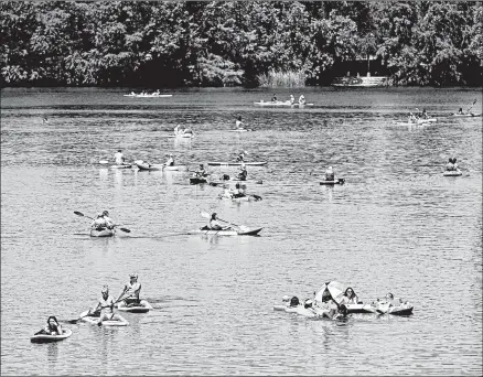  ?? TOM PENNINGTON/GETTY ?? Barton Creek in Austin, Texas, draws swimmers, paddleboar­ders and kayakers on May 20.