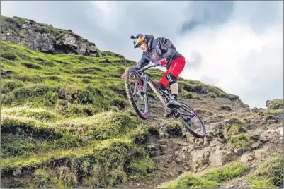  ??  ?? Top trials rider Danny MacAskill in action on his beloved Isle of Skye.