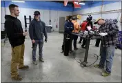  ?? MARK ZALESKI — THE ASSOCIATED PRESS ?? Payton Lane, 19, left, and Boone Williams, 20, talk during an apprentice training program class at the Plumbers and Pipefitter­s Local Union 572facilit­y in Nashville, Tenn.