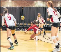 ?? DALHOUSIE UNIVERSITY PHOTO/VIA MEMORIAL ATHLETICS ?? Laura Fenez (13) of the Memorial Sea-hawks digs out a ball during Atlantic University Sport women’s volleyball play last weekend against the Dalhousie Tigers in Halifax. The Sea-hawks play their last matches of the regular season tonight, Saturday and...