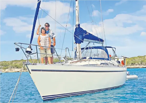  ?? ?? Mike and Helen Beech are stranded in the Bahamas after the yacht they spent their £50,000 life savings on was struck by lightning. The strike destroyed all of its electrical equipment, which will cost £36,000 to repair