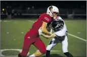  ??  ?? Christian Monterrosa/The Signal Caden Brenner (left) takes on a Mustang defender after catching a pass during a game Saturday.