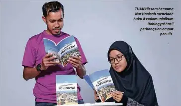  ??  ?? TUAN Hissam bersama Nur Hanisah menelaah buku Assalamual­aikum
Rohingya! hasil perkongsia­n empat
penulis.