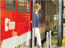 ??  ?? Wynne steps off an O-Train Thursday. The provincial Liberal party says it was paying for “any direct or indirect costs” entailed by her use of the train.