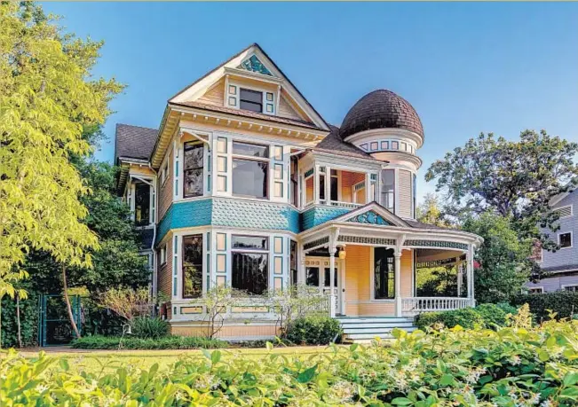  ?? Erik Grammer ?? JED GOULD, the disc jockey known as Jed the Fish, has put his Queen Anne Victorian, which dates to more than a century ago, on the market for $2.299 million.