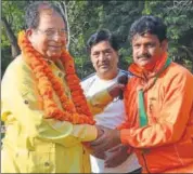  ?? HT ?? Supporters greet BJP MLA Narpat Singh Rajvi, who was the party ticket again for the assembly elections, in Jaipur on Monday.