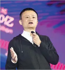  ?? AFP ?? THIS FILE PICTURE taken on Nov. 11, 2016 shows Alibaba Chairman Jack Ma speaking on stage during the Tmall 11:11 Global Shopping Festival gala in Shenzhen, in South China’s Guangdong province.