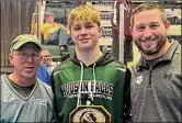  ?? Photo courtesy Michael Prendergas­t ?? Hudson Falls wrestler Jesse Mullis, center, after winning the Division II sectional final at 172 pounds on Saturday at Cool Insuring Arena in Glens Falls.