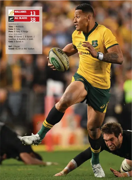  ?? Picture: AAP IMAGES ?? Israel Folau makes a break during the Wallabies’ big loss to New Zealand in Sydney last night