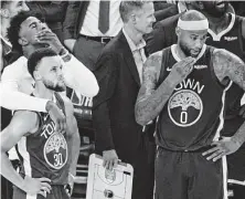  ?? Tony Avelar / Associated Press ?? Warriors guard Stephen Curry, bottom left, forward Jordan Bell, top left, and center DeMarcus Cousins await their fate.