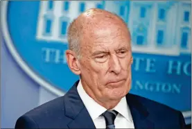  ?? Ap-evan Vucci, File ?? Director of National Intelligen­ce Dan Coats listens during a daily press briefing at the White House in Washington. Coats is to resign in days, after a two-year tenure.