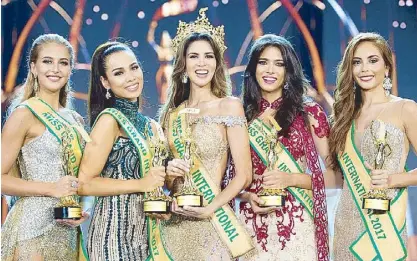  ??  ?? The Philippine­s’ Elizabeth Clenci (second from left), second runner-up in the 2017 Miss Grand Internatio­nal, with (from left) Czech Republic’s Nikola Ulirova (fourth runner-up), Peru’s Maria Jose Lora (winner), Venezuela’s Tulia Rosa Maria Aleman...