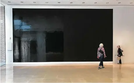  ?? Molly Glentzer / Houston Chronicle ?? Sol LeWitt’s “Glossy and Flat Black Squares,” an installati­on of monumental wall paintings, were the opening presentati­on at Rice Gallery in 1997 and have been remade for the final show there, on view through May 14.