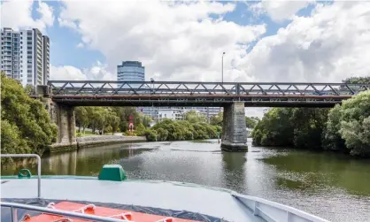  ??  ?? Thenew River Class ferries (not the boat pictured), purchased from Indonesia, are too high for passengers to be on the top deck when it goes under the Camellia Railway Bridge and Gasworks Bridge on the Parramatta River. Photograph: Martin Ohye