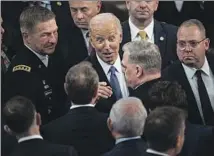  ?? Kent Nishimura Los Angeles Times ?? THE PRESIDENT takes a victory lap in the House chamber after his State of the Union address on Tuesday.