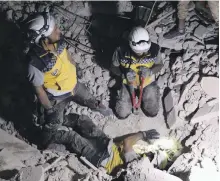  ?? AFP ?? White Helmets volunteers said a child was killed by government air strikes on four rebel-held towns